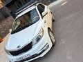 2015 Kia Rio III Рестайлинг, белый, 550000 рублей - вид 1