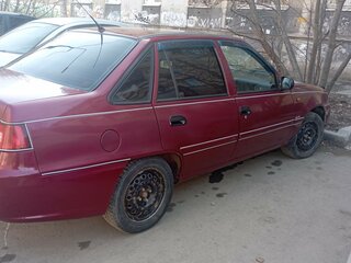 2011 Daewoo Nexia I Рестайлинг, пурпурный, 230000 рублей, вид 2