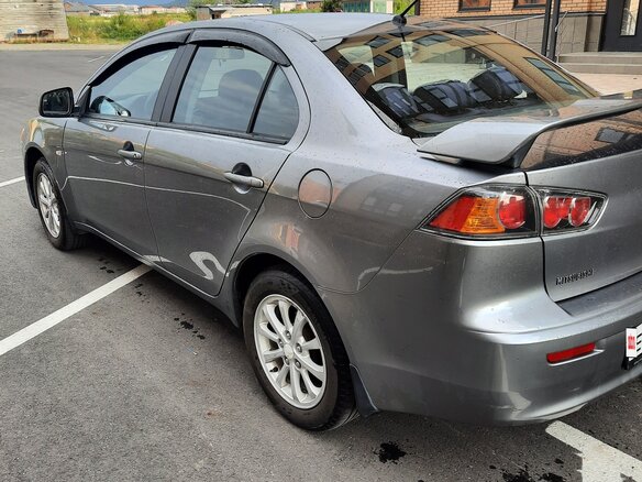 2012 Mitsubishi Lancer X Рестайлинг, серый - вид 3