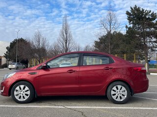 2013 Kia Rio 5-speed III, красный, 785000 рублей, вид 5