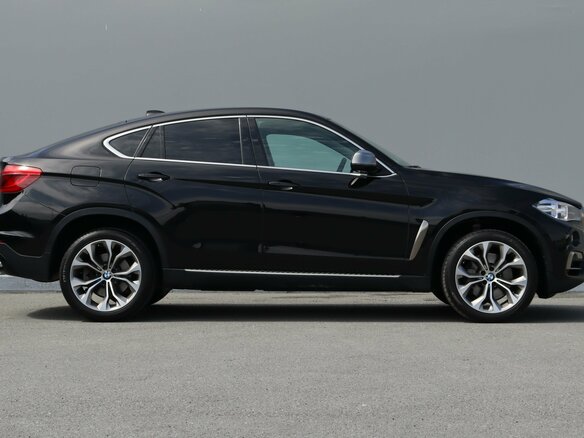 2015 BMW X6 50i II (F16), чёрный - вид 2