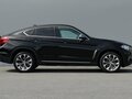 2015 BMW X6 50i II (F16), чёрный - вид 2