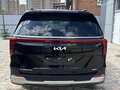 2025 Kia Carnival IV Рестайлинг, чёрный - вид 2