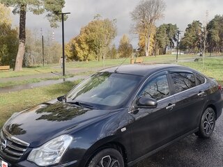 2014 Nissan Almera III (G15), чёрный, 750000 рублей, вид 2