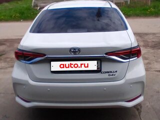 2021 Toyota Corolla XII (E210), белый, 1850000 рублей, вид 4