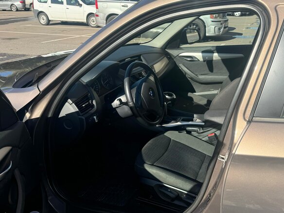 2012 BMW X1 18i I (E84) Рестайлинг, коричневый, 1650000 рублей - вид 5