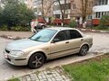 2000 Mazda 323 VI (BJ), серый, 300000 рублей - вид 1