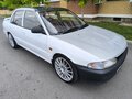 1991 Mitsubishi Lancer VI, белый - вид 1