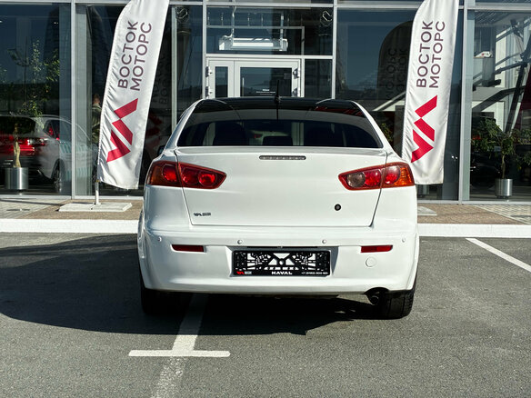 2007 Mitsubishi Lancer X, белый - вид 6