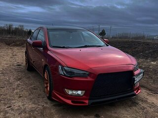 2008 Mitsubishi Lancer X, красный, 680000 рублей, вид 2