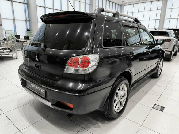 2004 Mitsubishi Outlander I, чёрный - вид 4