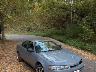 1994 Toyota Sprinter Marino, серый, 240000 рублей, вид 1