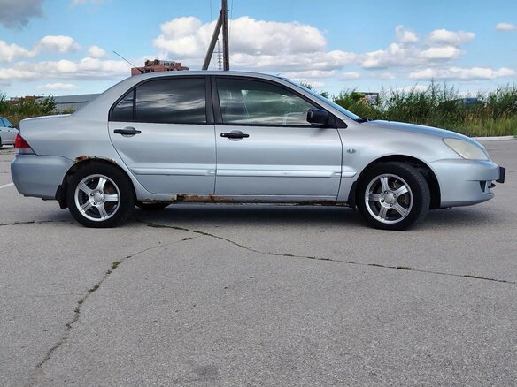 2006 Mitsubishi Lancer IX Рестайлинг, серебристый, 199999 рублей - вид 2