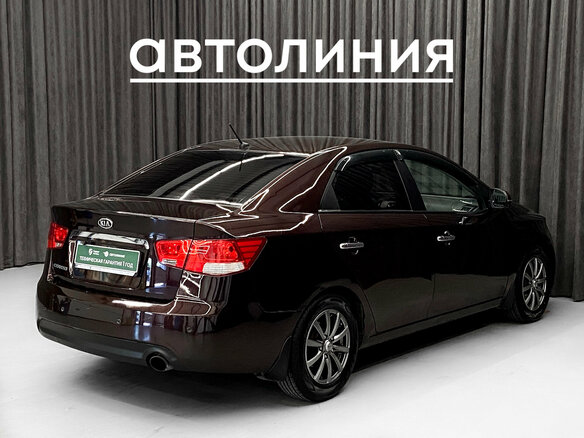 2011 Kia Cerato 6-speed II, красный - вид 2