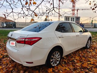 2013 Toyota Corolla XI (E160, E170, E180), белый, 1360000 рублей, вид 3