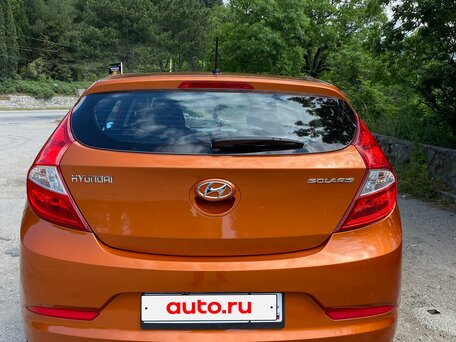 2014 Hyundai Solaris I Рестайлинг, оранжевый, 1100000 рублей, вид 4