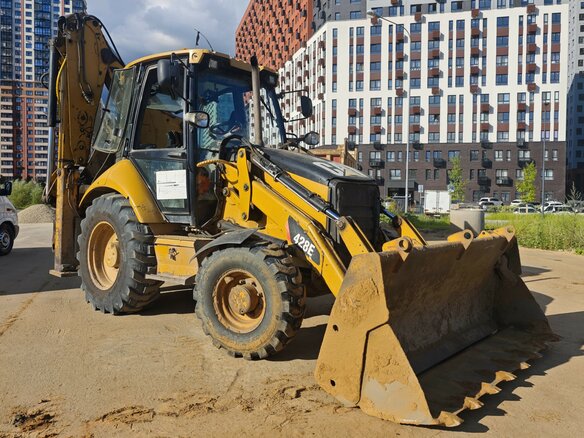 2011 Caterpillar 428, жёлтый, 4200000 рублей