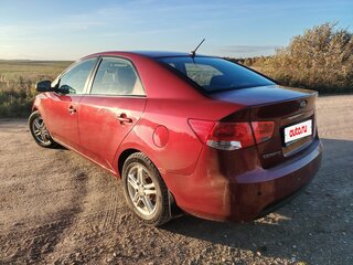 2011 Kia Cerato 6-speed II, красный, 860000 рублей, вид 5