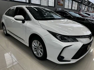 2022 Toyota Corolla XII (E210), белый, 1615000 рублей, вид 1