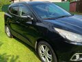 2012 Hyundai ix35 I, чёрный - вид 1