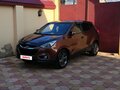 2013 Hyundai ix35 I Рестайлинг, коричневый, 1400000 рублей - вид 1