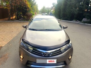 2014 Toyota Corolla XI (E160, E170, E180), золотистый, 1815000 рублей, вид 2