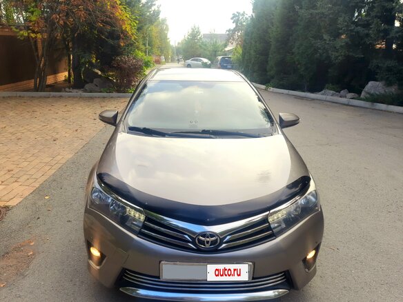 2014 Toyota Corolla XI (E160, E170, E180), золотистый, 1800000 рублей - вид 1