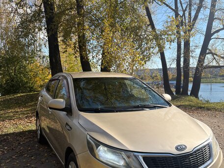 2012 Kia Rio 4-speed III, бежевый, 730000 рублей, вид 1