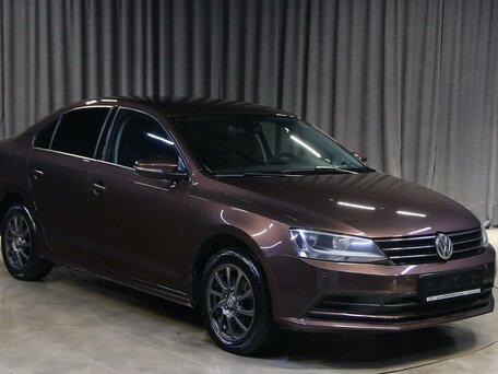 2016 Volkswagen Jetta VI Рестайлинг, коричневый, 1099000 рублей, вид 3