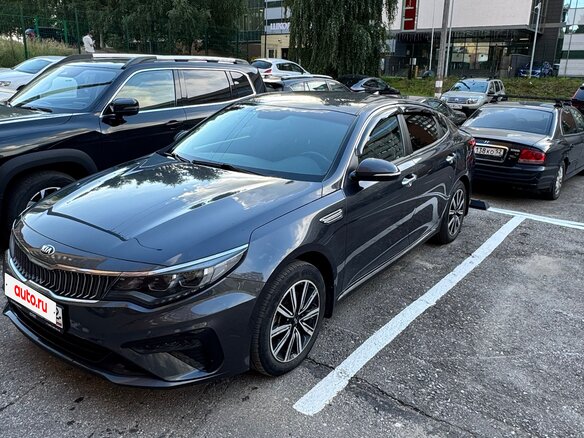 2019 Kia Optima IV Рестайлинг, серый, 2300000 рублей - вид 1