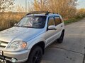 2013 Chevrolet Niva I Рестайлинг, серебристый, 630000 рублей
