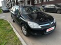 2011 Opel Astra H Рестайлинг, чёрный - вид 1
