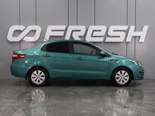 2012 Kia Rio 5-speed III, зелёный, 779000 рублей, вид 5