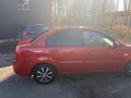 2010 Kia Rio II Рестайлинг, красный, 550000 рублей - вид 5
