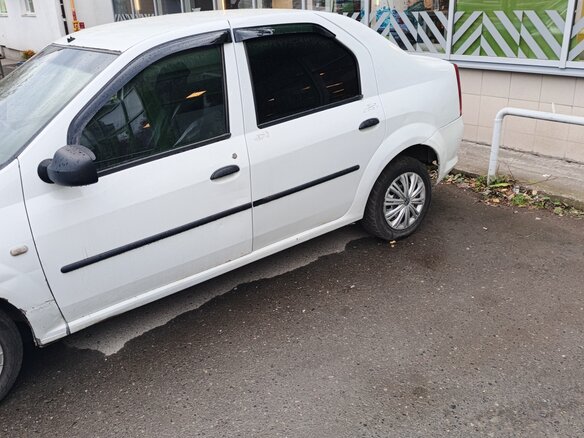 2010 Renault Logan I Рестайлинг, белый - вид 4