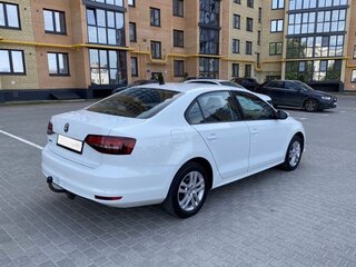 2016 Volkswagen Jetta VI Рестайлинг, белый, 1030000 рублей, вид 2