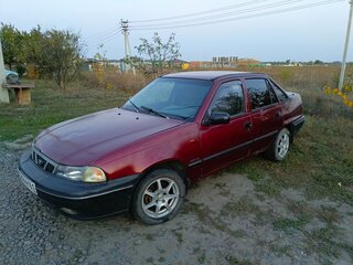 2005 Daewoo Nexia I, пурпурный, 87000 рублей, вид 5