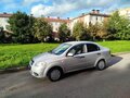 2011 Chevrolet Aveo I Рестайлинг, серебристый, 270000 рублей - вид 1