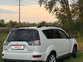 2011 Mitsubishi Outlander II Рестайлинг, белый, 1300000 рублей - вид 2