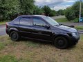2009 Renault Logan I, чёрный, 420000 рублей - вид 1