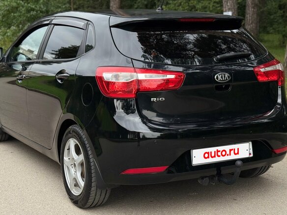 2013 Kia Rio 4-speed III, чёрный, 620000 рублей - вид 6