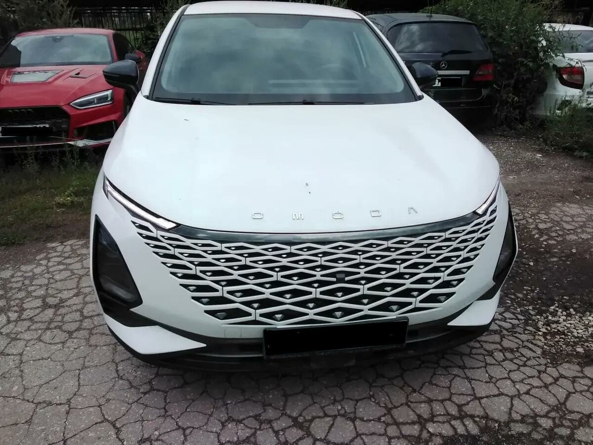 Открыть фотографии: Omoda C5 I