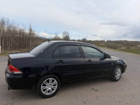 2007 Mitsubishi Lancer IX Рестайлинг, чёрный, 230000 рублей - вид 2