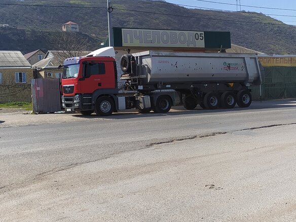 2011 MAN TGS, красный, 5500000 рублей - вид 3
