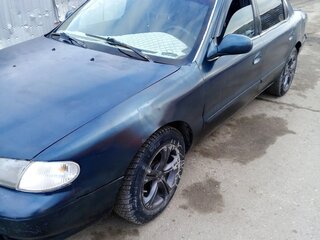 1997 Kia Clarus I, зелёный, 170000 рублей, вид 2