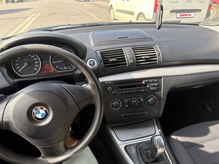 2010 BMW 1 серии 116i I (E81/E82/E87/E88) Рестайлинг, чёрный, 720000 рублей, вид 5