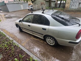2002 Mitsubishi Carisma I Рестайлинг, серебристый, 139990 рублей, вид 3