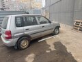 2000 Mazda Demio I (DW), серый - вид 1