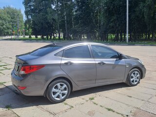 2013 Hyundai Solaris I, чёрный, 660000 рублей, вид 2