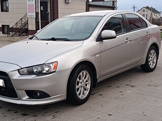 2012 Mitsubishi Lancer X Рестайлинг, серебристый, 780000 рублей, вид 1
